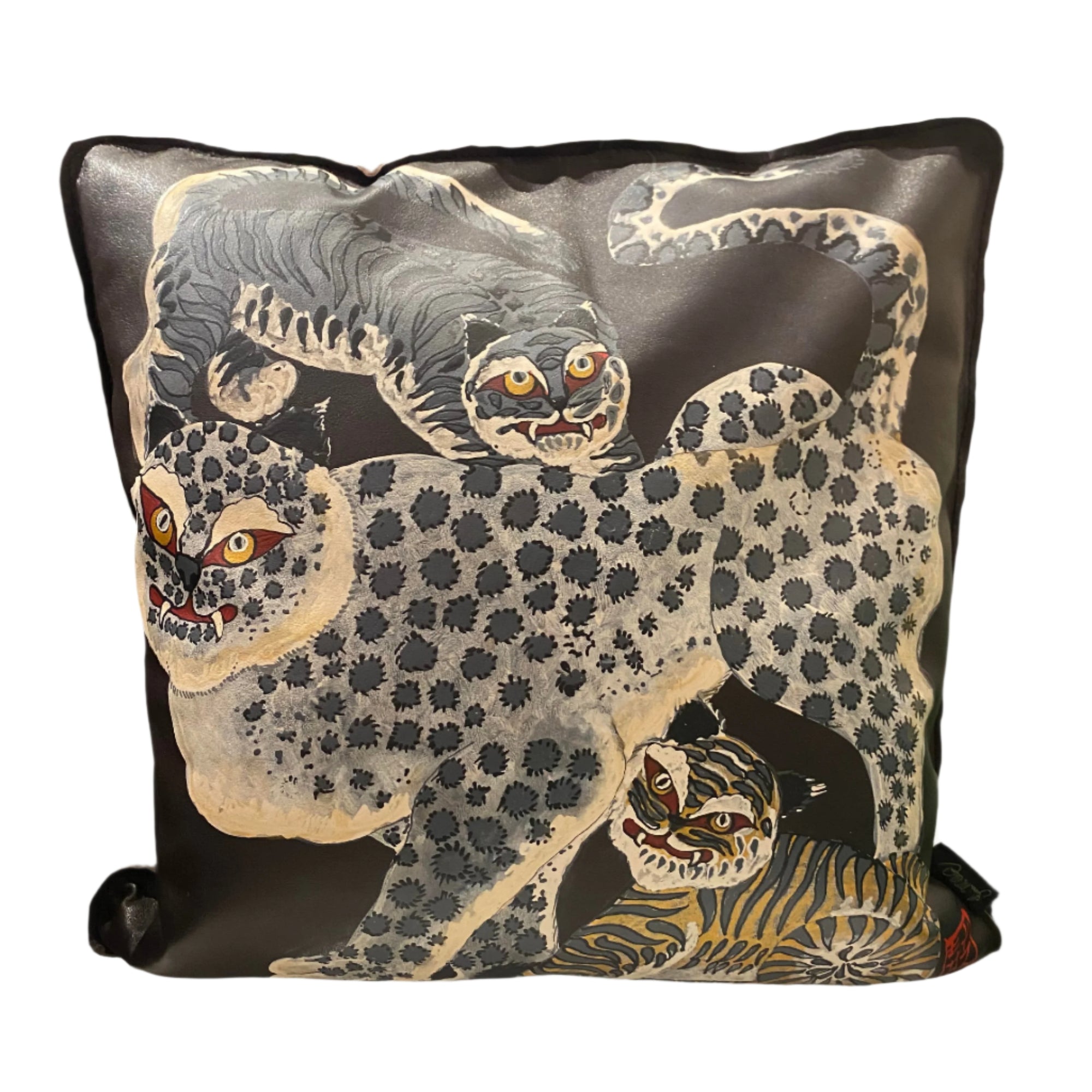 Decorative pillow with animal design on a chair in a room setting