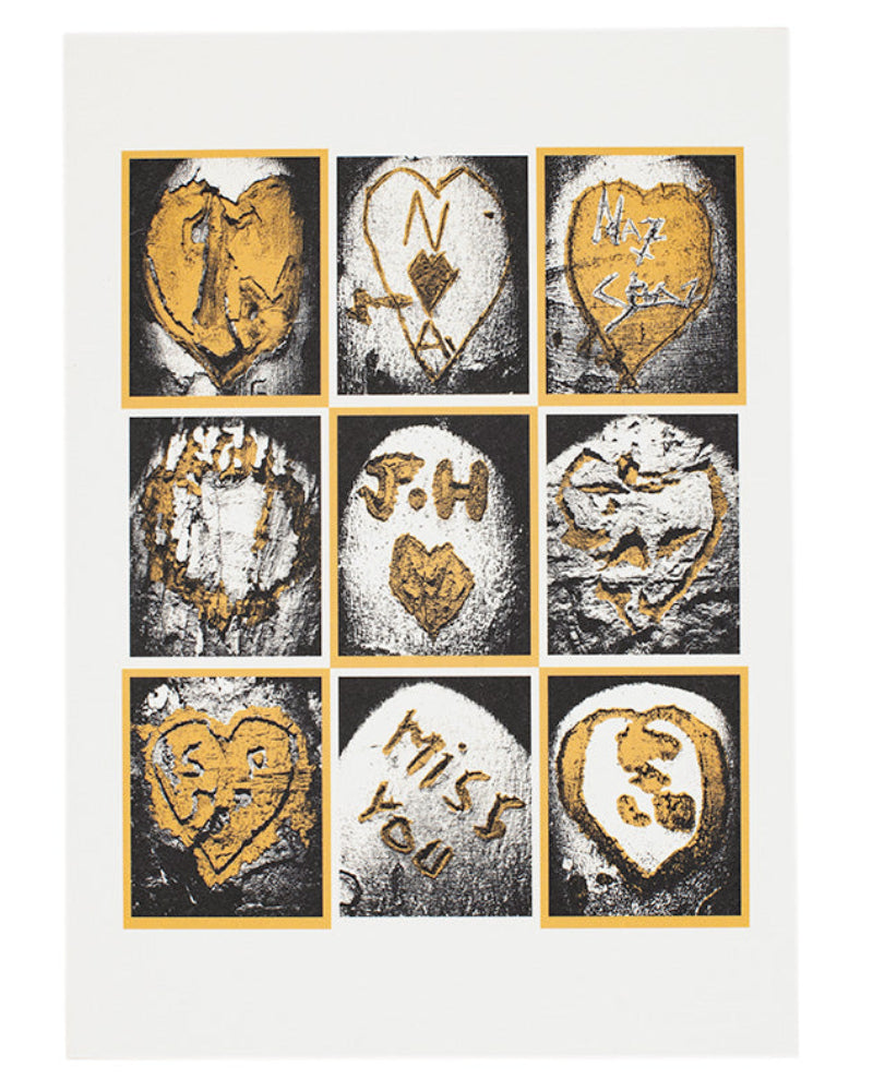 Nine heart-shaped stamps with varying designs on a white card