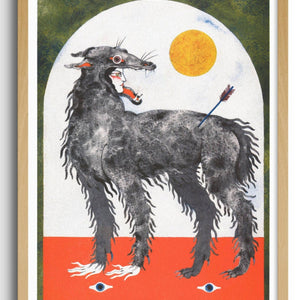 Framed artwork of a dog with a colorful background on a white wall
